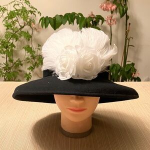 Elegant Black Wool Hat with White Floral and Feather Accent